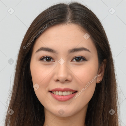 Joyful asian young-adult female with long  brown hair and brown eyes