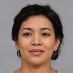 Joyful asian young-adult female with medium  brown hair and brown eyes