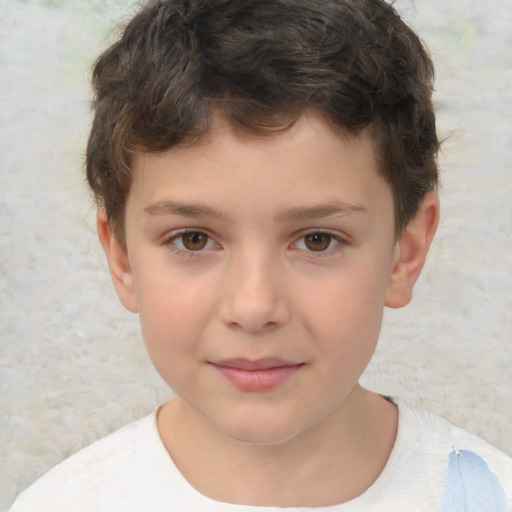 Joyful white child male with short  brown hair and brown eyes