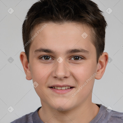 Joyful white child male with short  brown hair and brown eyes