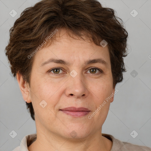 Joyful white adult female with short  brown hair and brown eyes