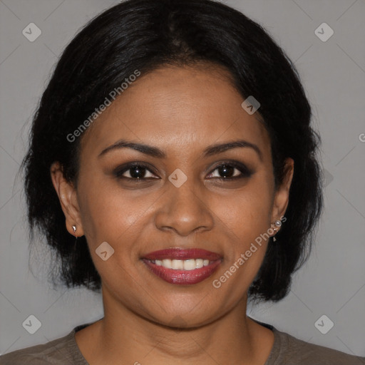 Joyful black young-adult female with medium  brown hair and brown eyes