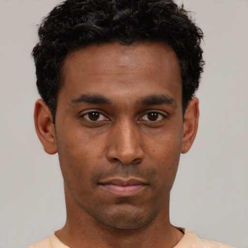 Neutral black young-adult male with short  brown hair and brown eyes