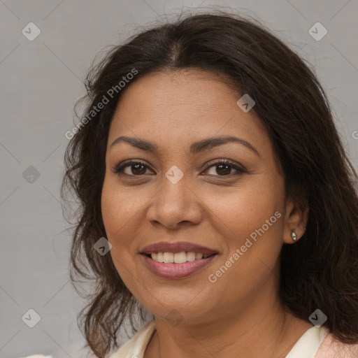 Joyful white adult female with medium  brown hair and brown eyes