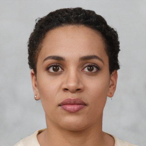 Neutral latino young-adult female with short  brown hair and brown eyes