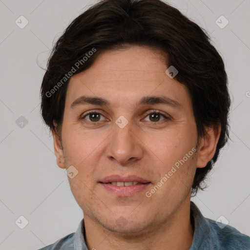 Joyful white adult female with short  brown hair and brown eyes