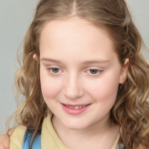 Joyful white child female with medium  brown hair and blue eyes