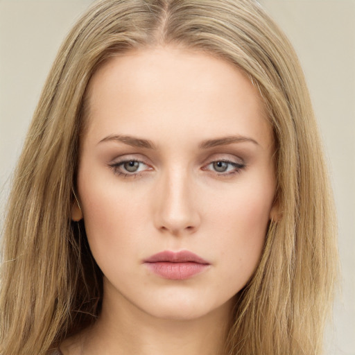 Neutral white young-adult female with long  brown hair and green eyes