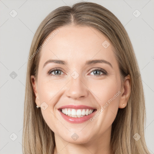 Joyful white young-adult female with long  brown hair and grey eyes