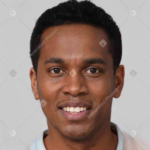 Joyful black young-adult male with short  black hair and brown eyes