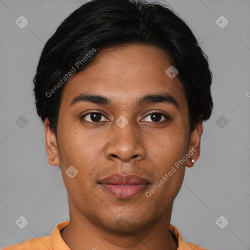 Joyful latino young-adult male with short  black hair and brown eyes