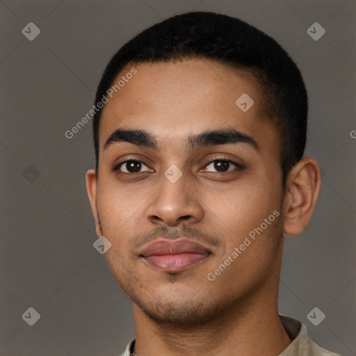 Joyful black young-adult male with short  black hair and brown eyes