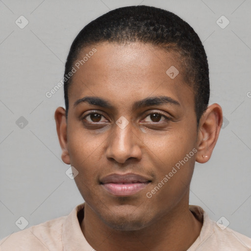 Joyful black young-adult male with short  brown hair and brown eyes