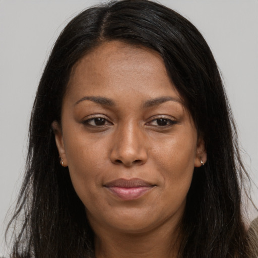 Joyful asian young-adult female with long  brown hair and brown eyes