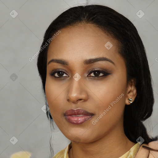 Joyful asian young-adult female with long  black hair and brown eyes
