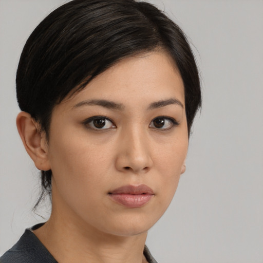 Neutral latino young-adult female with medium  black hair and brown eyes