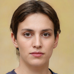 Neutral white young-adult female with short  brown hair and brown eyes