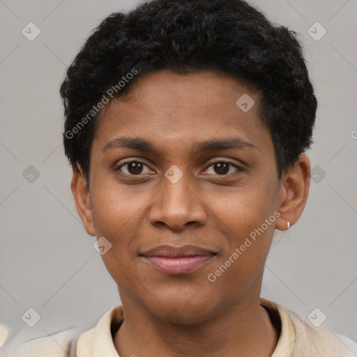 Joyful black young-adult male with short  brown hair and brown eyes