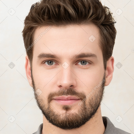 Neutral white young-adult male with short  brown hair and grey eyes