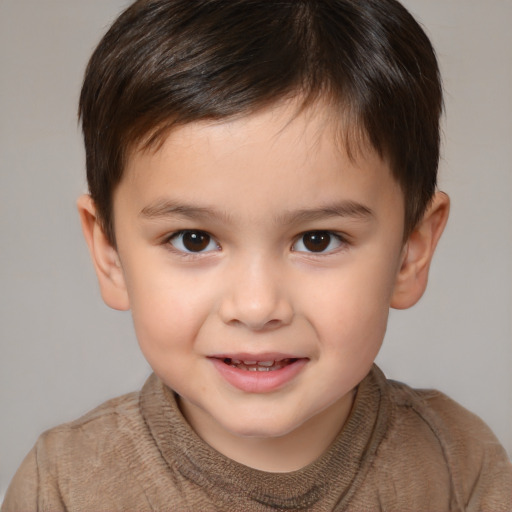 Joyful white child male with short  brown hair and brown eyes