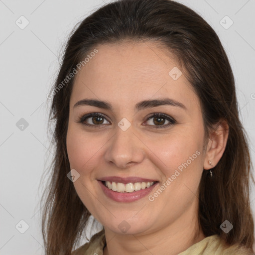 Joyful white young-adult female with medium  brown hair and brown eyes