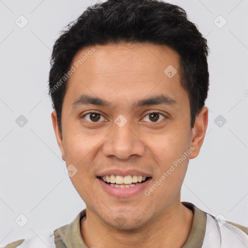 Joyful asian young-adult male with short  black hair and brown eyes