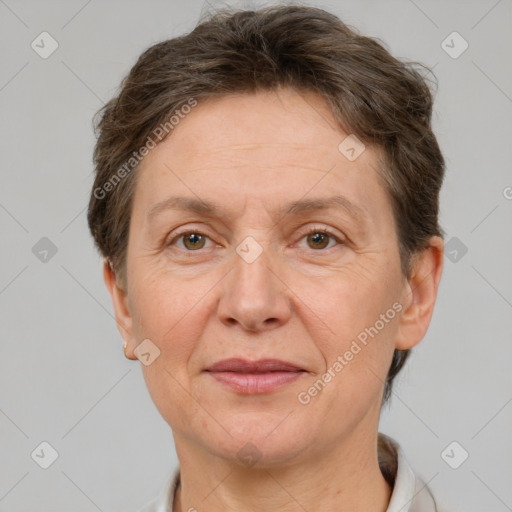 Joyful white adult female with short  brown hair and brown eyes