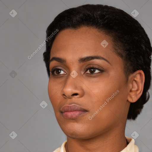 Neutral black young-adult female with short  black hair and brown eyes