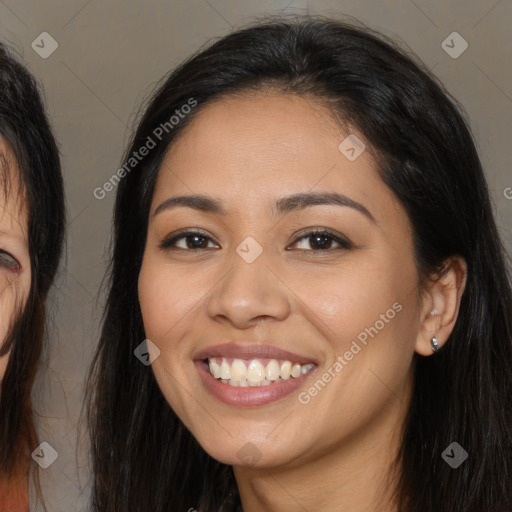 Joyful latino young-adult female with long  brown hair and brown eyes