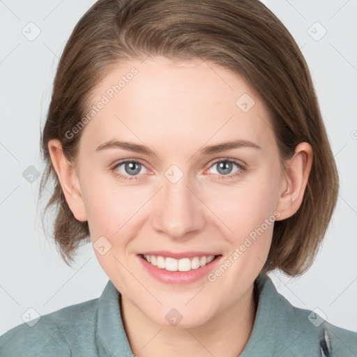 Joyful white young-adult female with medium  brown hair and blue eyes