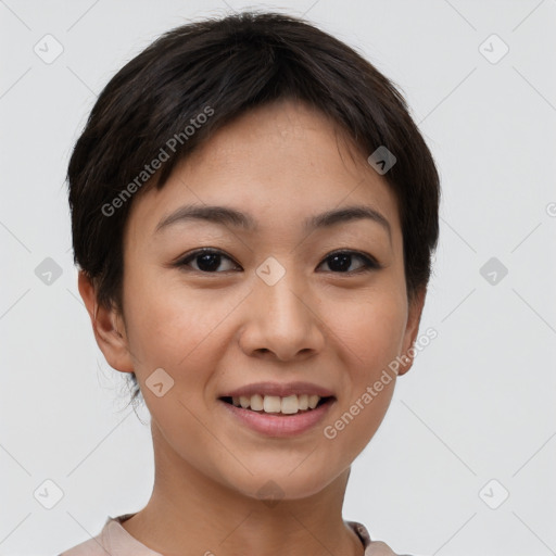 Joyful asian young-adult female with short  brown hair and brown eyes