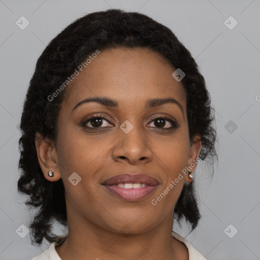 Joyful black young-adult female with medium  brown hair and brown eyes