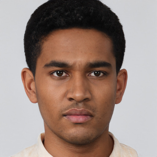 Neutral black young-adult male with short  brown hair and brown eyes