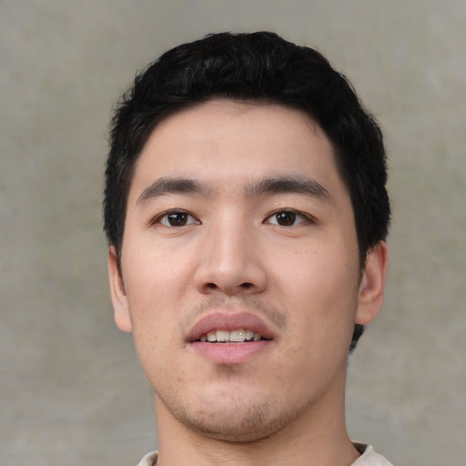 Neutral white young-adult male with short  black hair and brown eyes