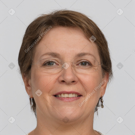 Joyful white adult female with short  brown hair and grey eyes