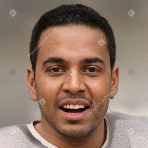 Joyful white young-adult male with short  black hair and brown eyes