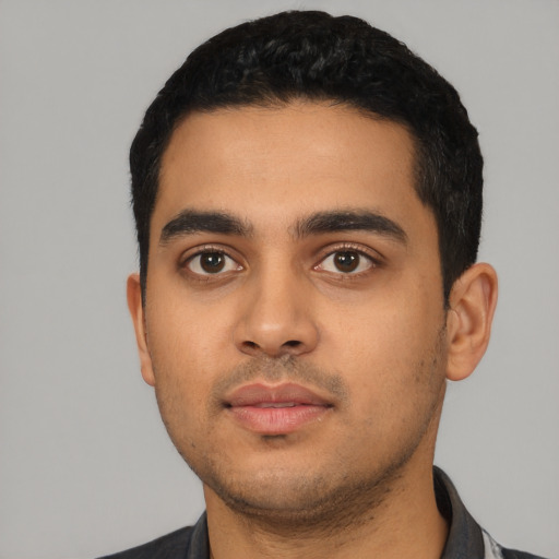 Neutral latino young-adult male with short  black hair and brown eyes