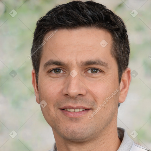 Joyful white adult male with short  brown hair and brown eyes