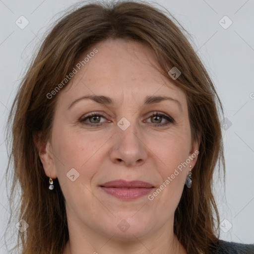 Joyful white adult female with medium  brown hair and grey eyes