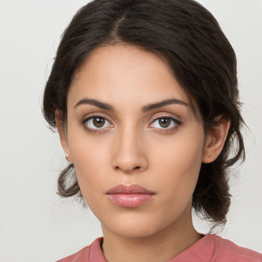 Neutral white young-adult female with medium  brown hair and brown eyes