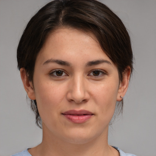 Joyful white young-adult female with medium  brown hair and brown eyes