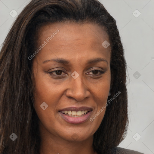 Joyful latino young-adult female with long  brown hair and brown eyes