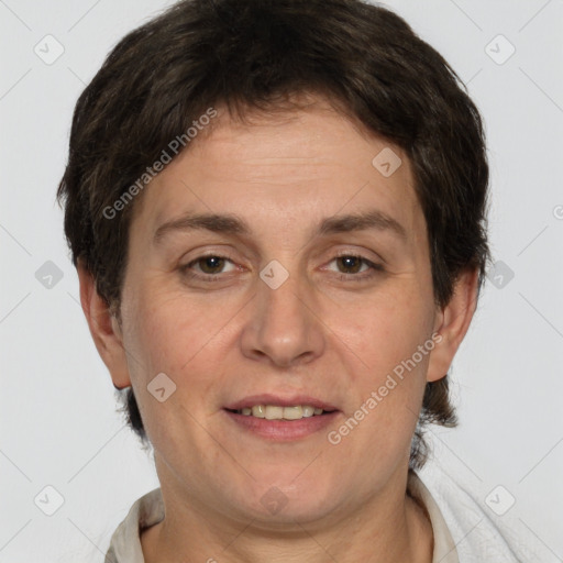 Joyful white adult female with short  brown hair and brown eyes