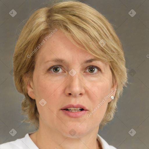 Joyful white adult female with medium  brown hair and brown eyes