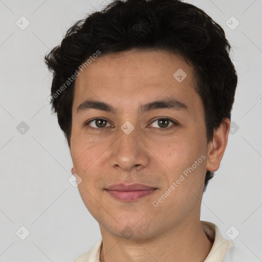 Joyful latino young-adult male with short  brown hair and brown eyes