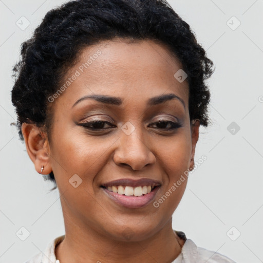 Joyful latino young-adult female with short  brown hair and brown eyes