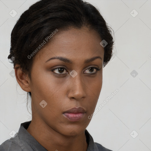 Neutral black young-adult female with short  brown hair and brown eyes