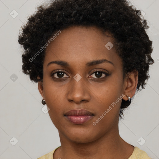 Neutral black young-adult female with short  black hair and brown eyes