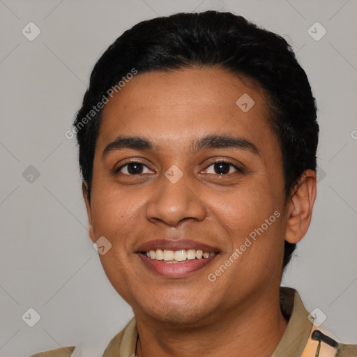 Joyful latino young-adult male with short  black hair and brown eyes