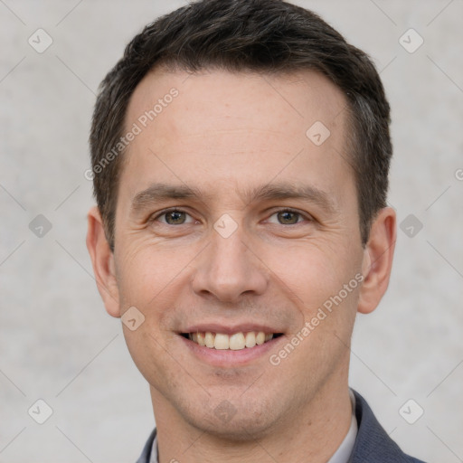 Joyful white young-adult male with short  brown hair and brown eyes